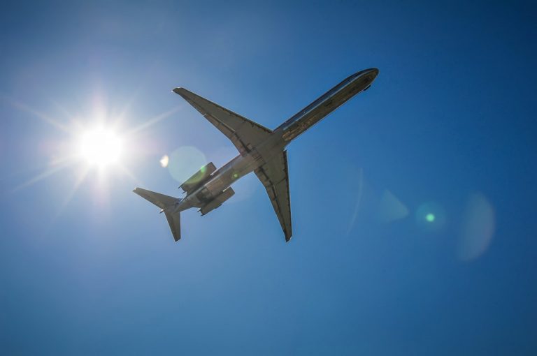 jet-airplane-in-the-sky-with-sun